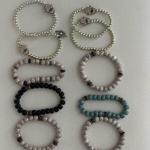 Set of 10 beaded bracelets with hamsa hand and evil eye charms
